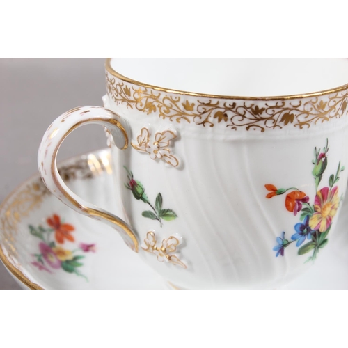 262 - KPM cabinet cup and saucer with gilt rim and floral decoration.
