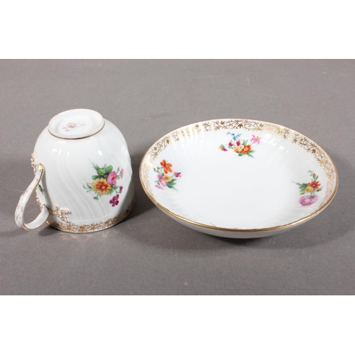 262 - KPM cabinet cup and saucer with gilt rim and floral decoration.