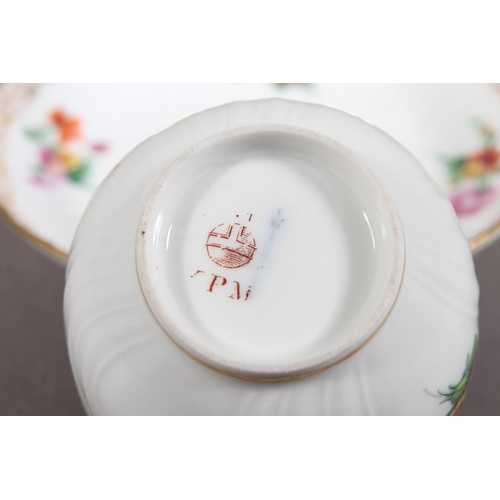 262 - KPM cabinet cup and saucer with gilt rim and floral decoration.