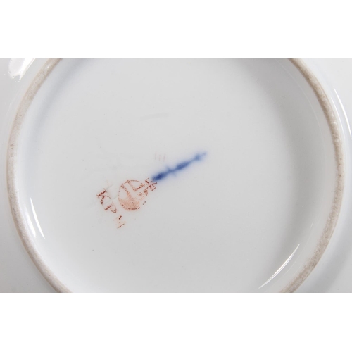 262 - KPM cabinet cup and saucer with gilt rim and floral decoration.