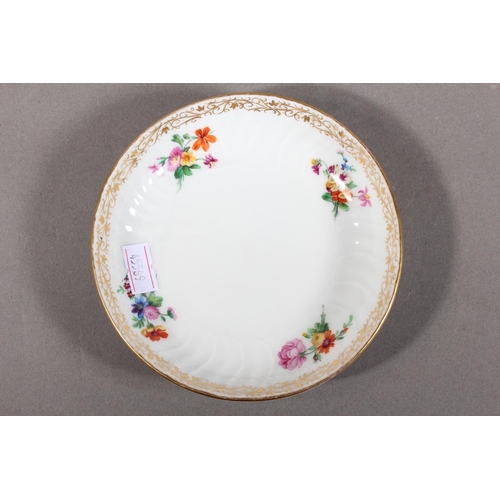 262 - KPM cabinet cup and saucer with gilt rim and floral decoration.