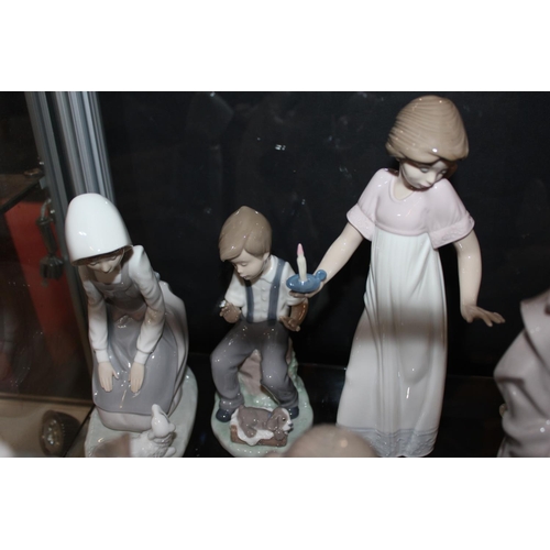 266 - Group of Nao figures (6)