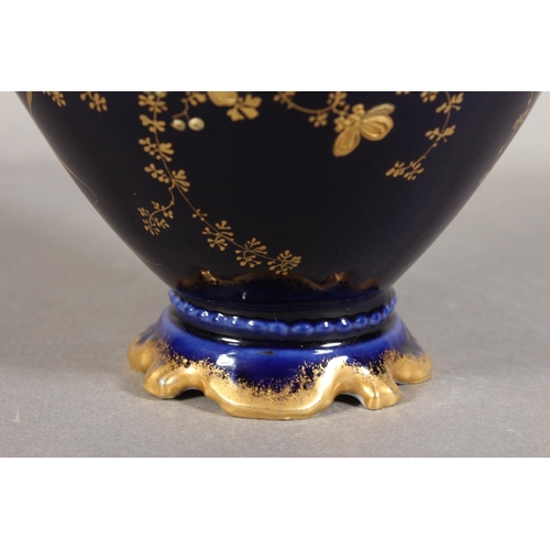 277 - Limoges for Maple and Co London vase with blue ground and elaborate gilt decoration, 19cm tall.