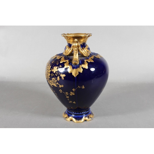 277 - Limoges for Maple and Co London vase with blue ground and elaborate gilt decoration, 19cm tall.