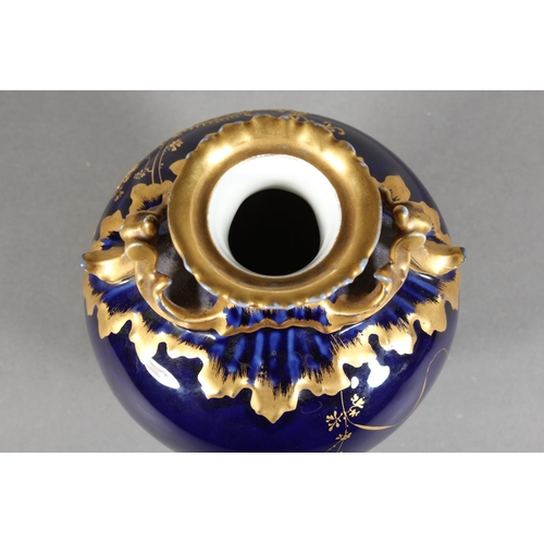 277 - Limoges for Maple and Co London vase with blue ground and elaborate gilt decoration, 19cm tall.