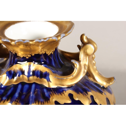 277 - Limoges for Maple and Co London vase with blue ground and elaborate gilt decoration, 19cm tall.