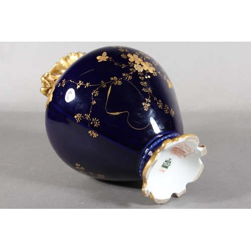 277 - Limoges for Maple and Co London vase with blue ground and elaborate gilt decoration, 19cm tall.