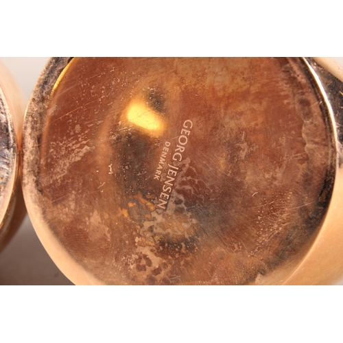 286 - Pair of Georg Jensen candlesticks.