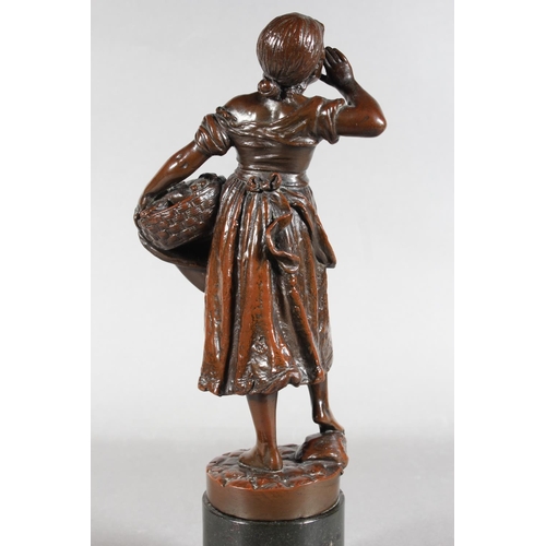 288 - Bronze effect sculpture of a girl with fish basket on stand, 30cm tall.