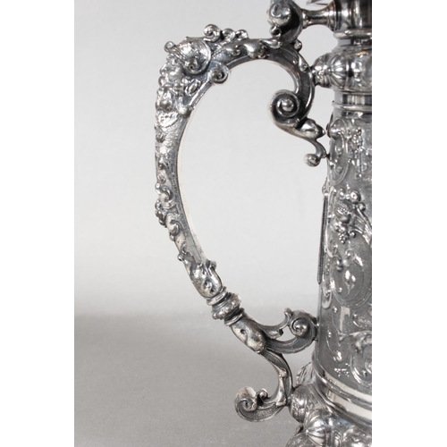 294 - Late 19th Century WMF silver plated tankard with elaborate decoration, 30cm tall.