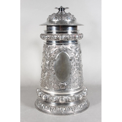 294 - Late 19th Century WMF silver plated tankard with elaborate decoration, 30cm tall.