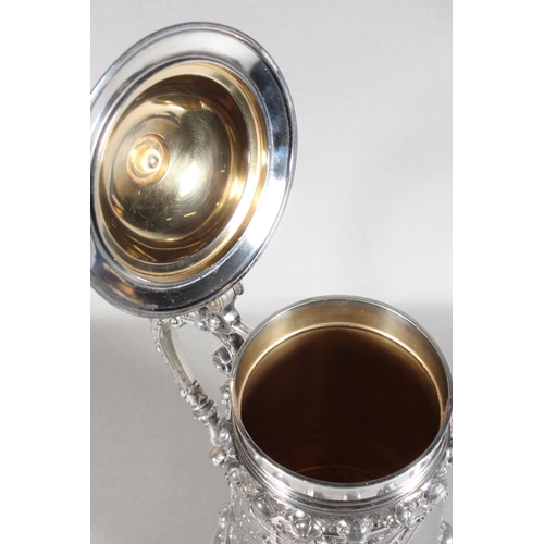 294 - Late 19th Century WMF silver plated tankard with elaborate decoration, 30cm tall.