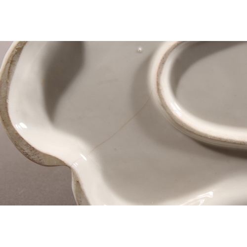 10C - Dresden of Germany figure group depicting a Victorian tea scene.