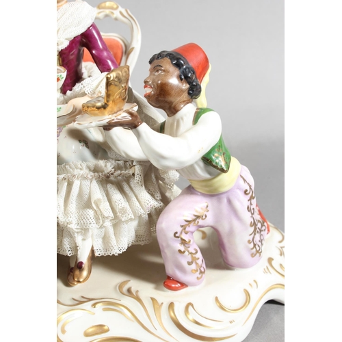 10C - Dresden of Germany figure group depicting a Victorian tea scene.