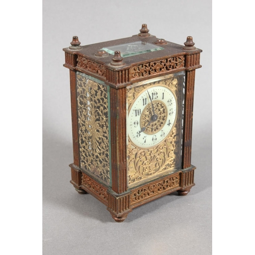 11 - Antique brass and four glass carriage clock, with white enamelled dial.
