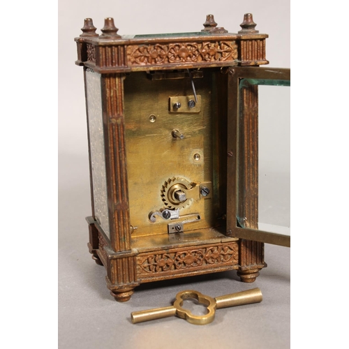 11 - Antique brass and four glass carriage clock, with white enamelled dial.