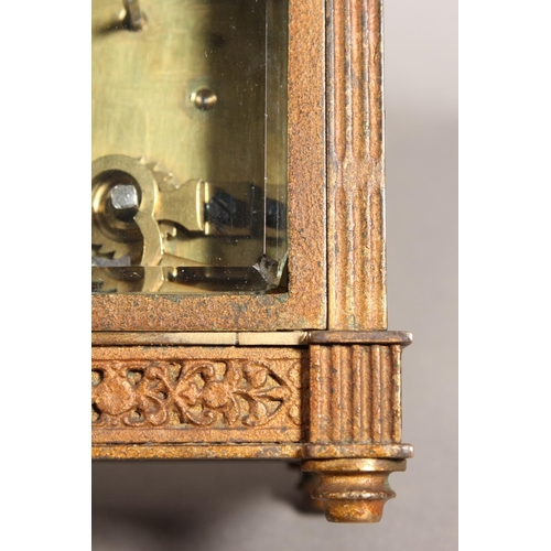 11 - Antique brass and four glass carriage clock, with white enamelled dial.