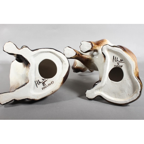 12 - Two Winstanley pottery cats with blue eyes.