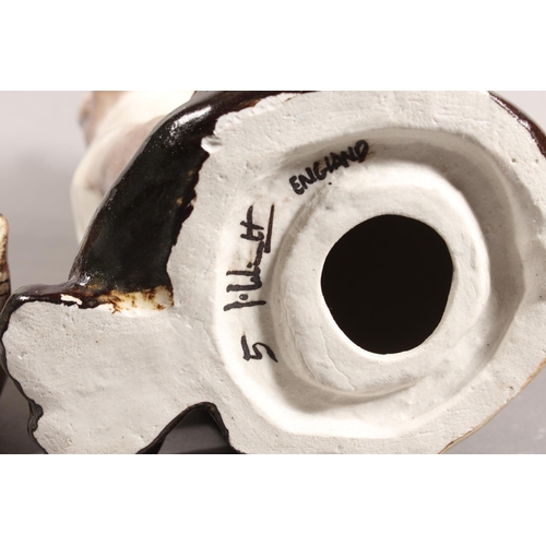 14 - Three Winstanley pottery Siamese cats with blue eyes, largest 31cm high.