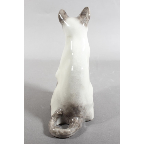 17 - Winstanley pottery Siamese cat with blue eyes, 20cm high.