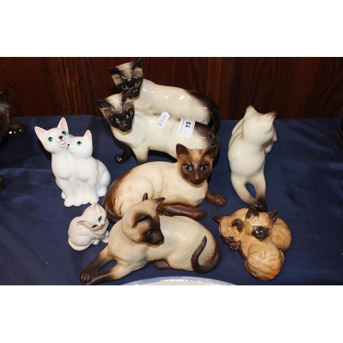19 - Beswick Siamese cat models.&nbsp; (8)