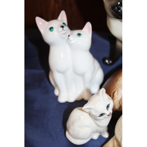 19 - Beswick Siamese cat models.&nbsp; (8)