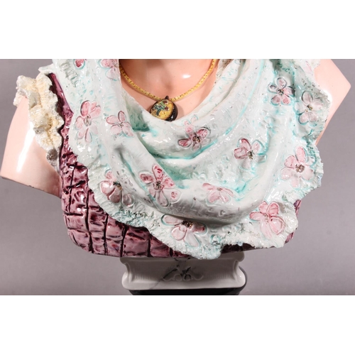 21 - Porcelain female bust in Victorian dress with locket, 50cm high.