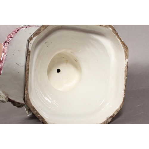 21 - Porcelain female bust in Victorian dress with locket, 50cm high.