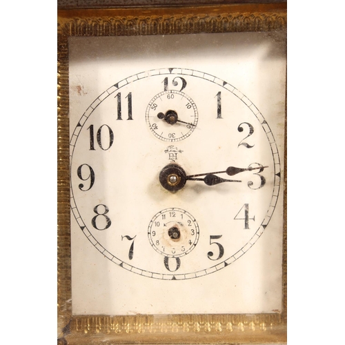 25 - Vintage carriage clock, with white face and two subsidiary dials.