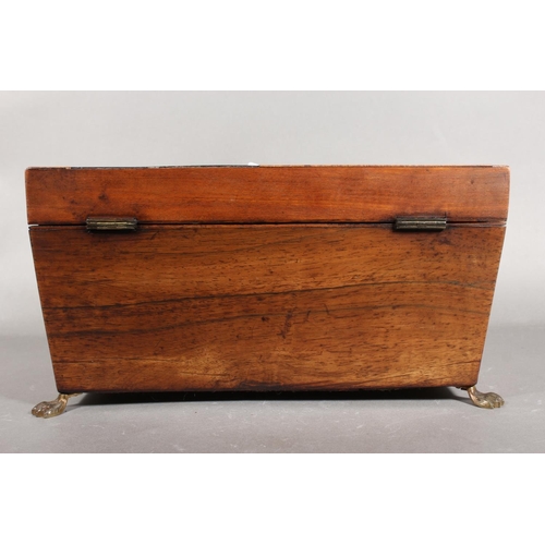 28 - Victorian tea caddy, raised on brass paw supports.