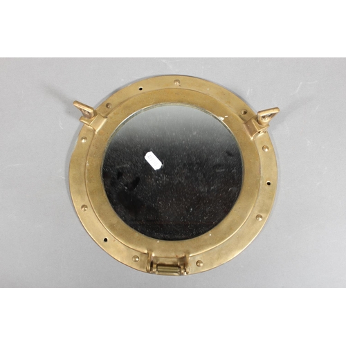 30 - Brass ship's porthole mirror, 28cm diameter.
