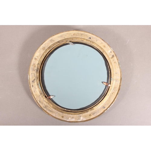 30 - Brass ship's porthole mirror, 28cm diameter.