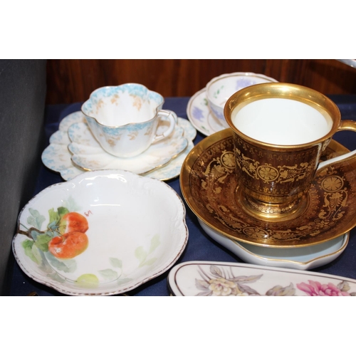 36 - Decorative ceramics to include a Carlton ware dish, a Rockingham trio, an antique Paris gilt decorat... 