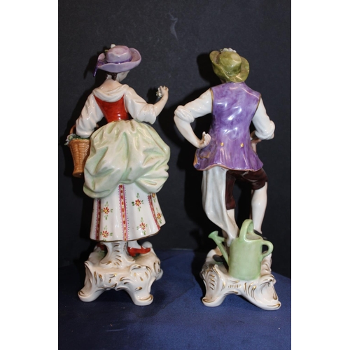 48 - Pair of Saxe of Germany porcelain figures modelled as a gentleman resting on a spade and a female ho... 