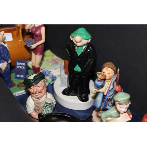 58 - Decorative ceramics to include Hummel figures, a Wade Andy Capp money box, a Cardew Collectors Club ... 