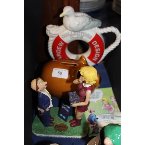 58 - Decorative ceramics to include Hummel figures, a Wade Andy Capp money box, a Cardew Collectors Club ... 