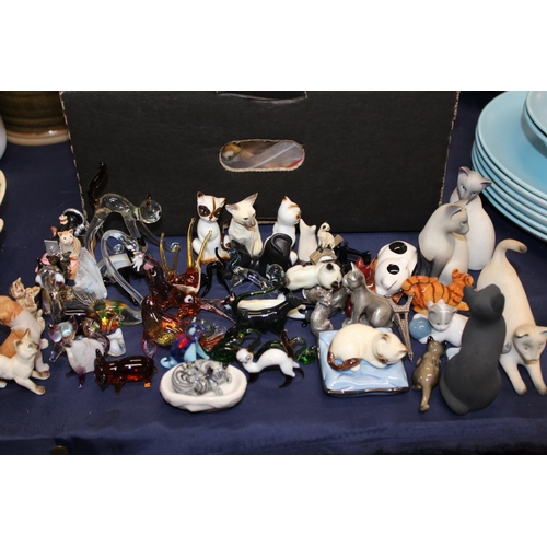 65 - Art Glass animal models, pottery animal models, small books, etc.