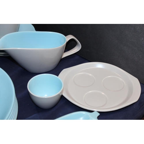 66 - Poole Pottery sky blue and dove grey part dinner set to include dinner plates, tureens and lids, cup... 