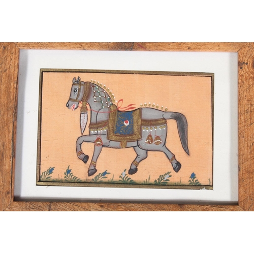 68 - Three Mughal Indian style silk pictures of royal horses, in wooden frames.