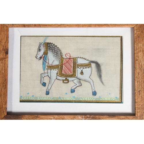 68 - Three Mughal Indian style silk pictures of royal horses, in wooden frames.