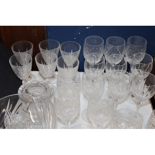 114 - Glassware to include wine glasses, tumblers, bowls, etc.