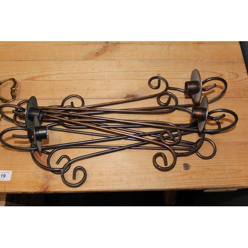 119 - Brass and metal wall mountable candle sconces.