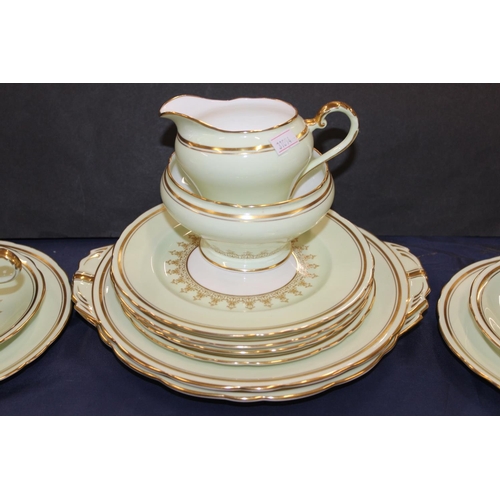 120 - Aynsley green and gilt decorated teaset.