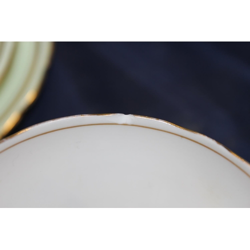 120 - Aynsley green and gilt decorated teaset.