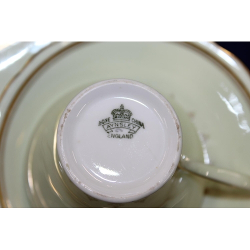120 - Aynsley green and gilt decorated teaset.