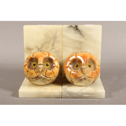 122 - Pair of onyx style bookends mounted with owl heads.