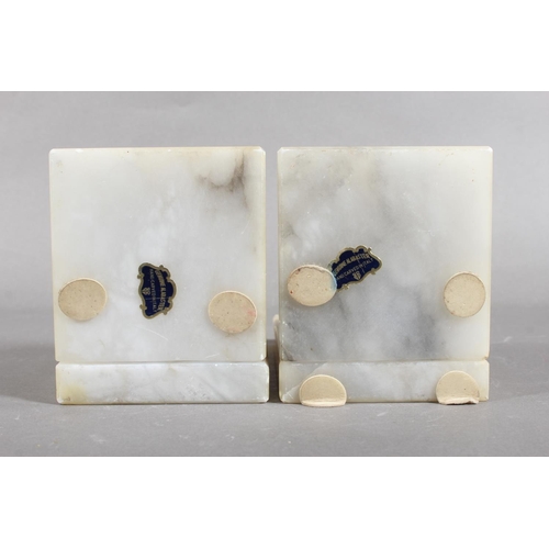 122 - Pair of onyx style bookends mounted with owl heads.