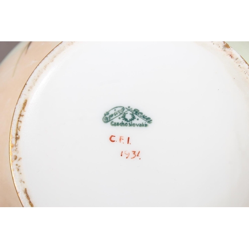 139 - Czechoslovakian floral decorated ginger jar and cover.