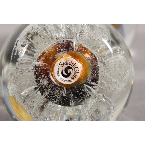 142 - Selkirk Glass paperweight and a Caithness Glass paperweight.