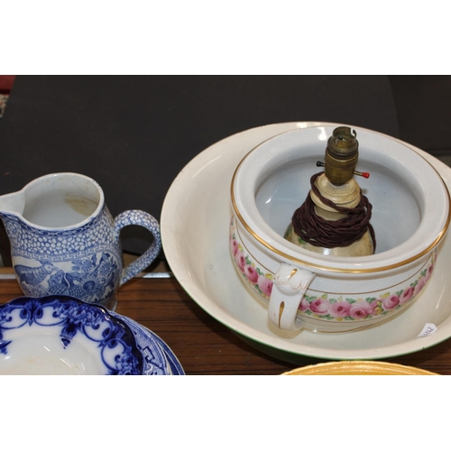 148 - Wash bowls, chamber pots, blue and white china, tea bowls, and other ceramics.